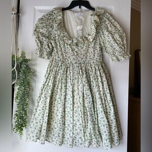 Boutique puff sleeve dress with buttons!